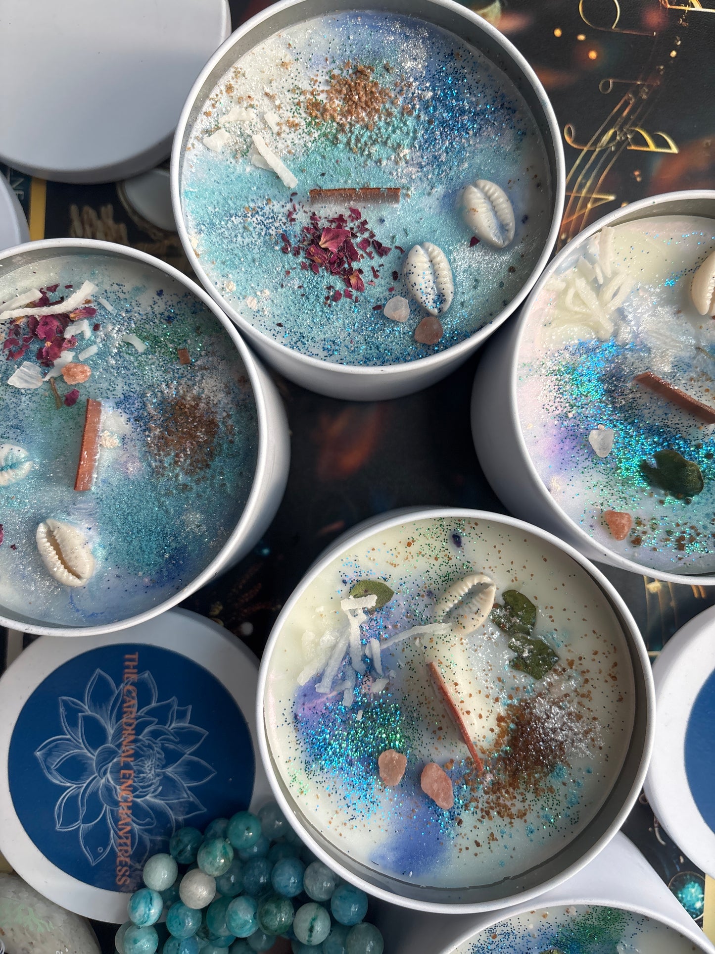 Le Siren candle with pearls close-up showing La Siren devotional altar setup
