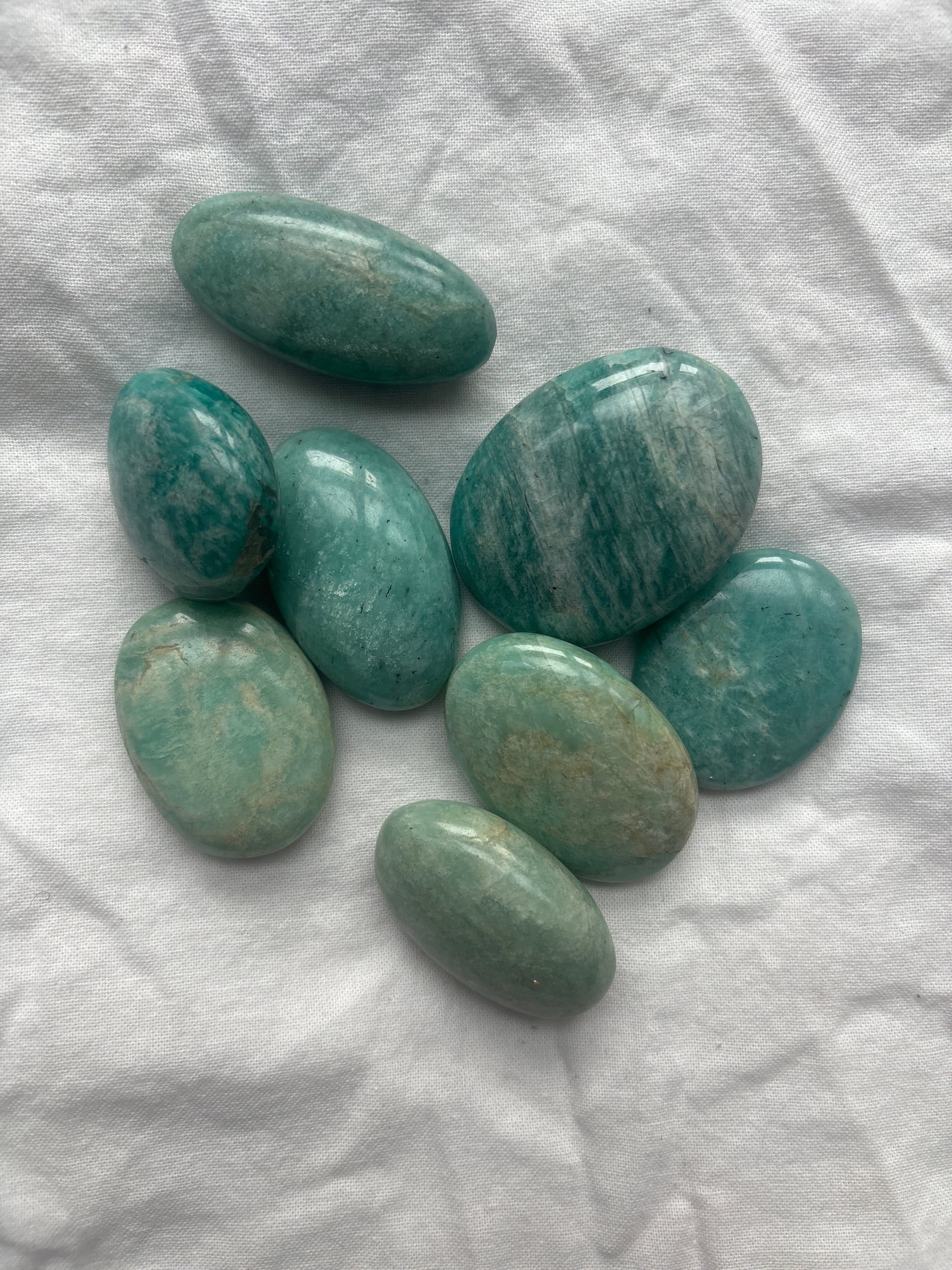 Polished Amazonite stones for soothing harmony, emotional balance, and heart communication