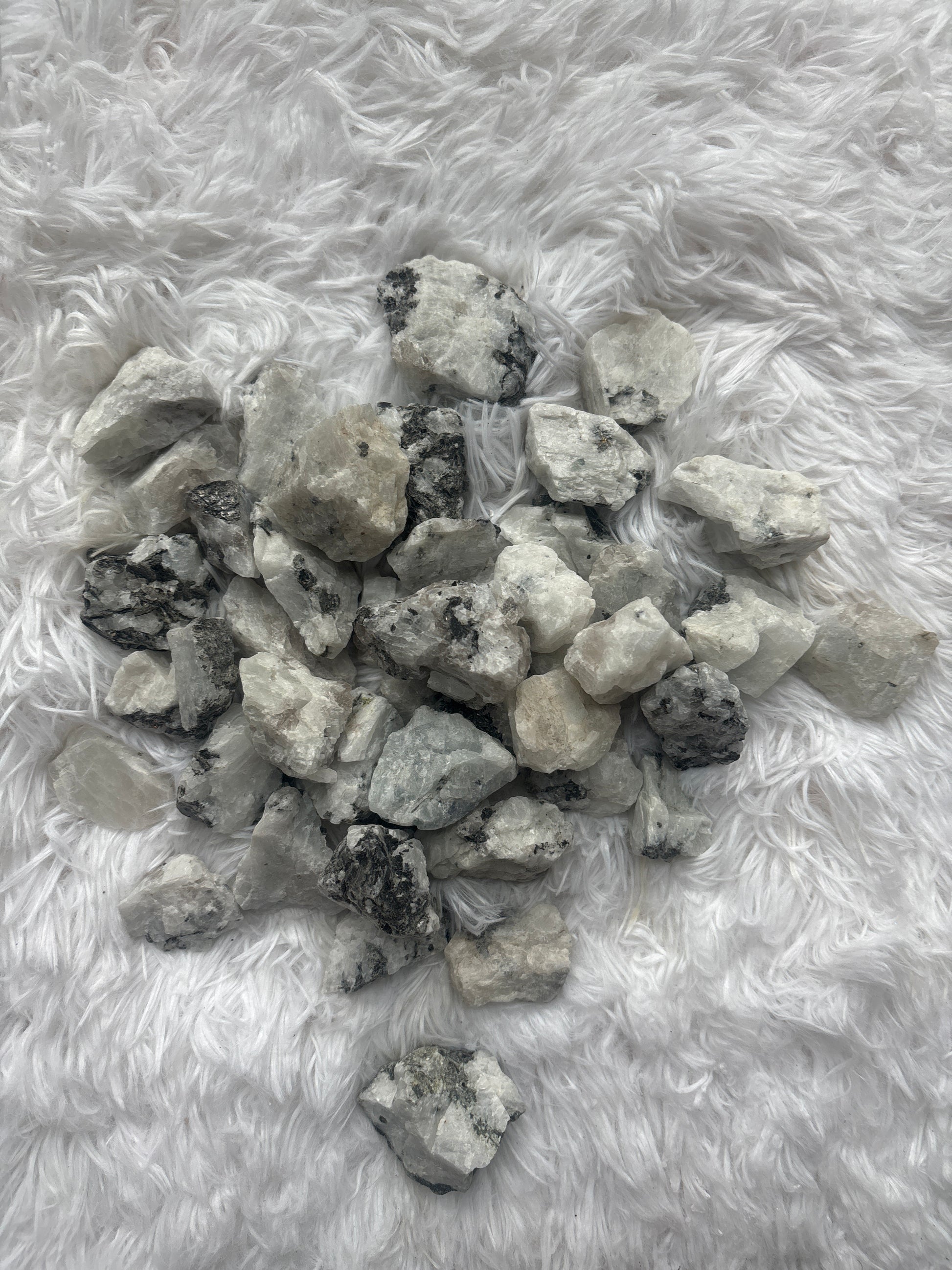 Raw Rainbow Moonstone crystal for intuition, divine feminine energy, and inner harmony