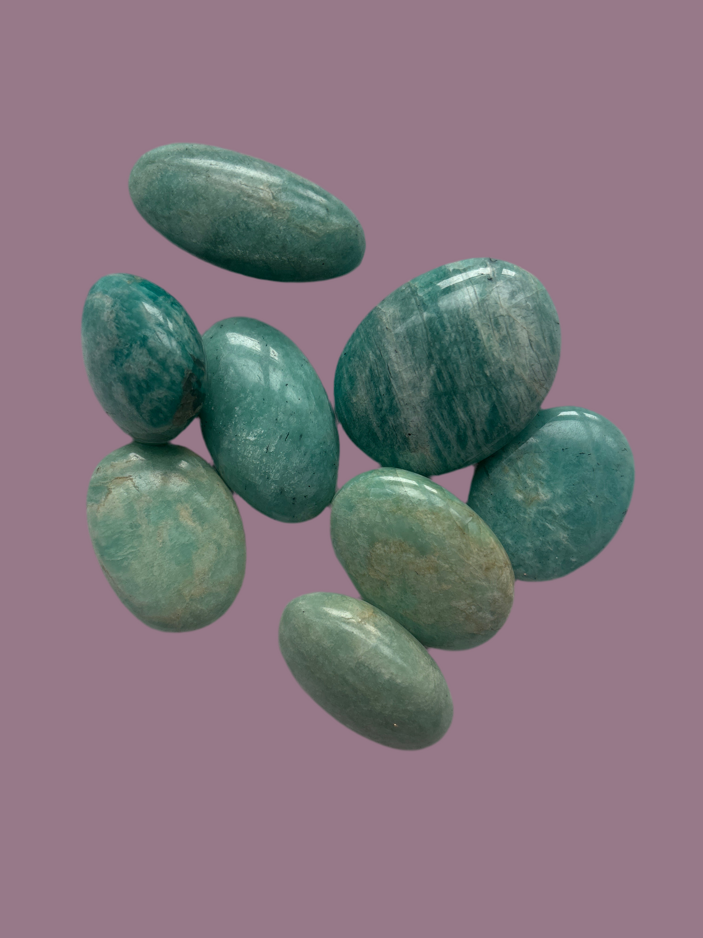 Amazonite polished stones close-up showing natural blue-green color and smooth finish