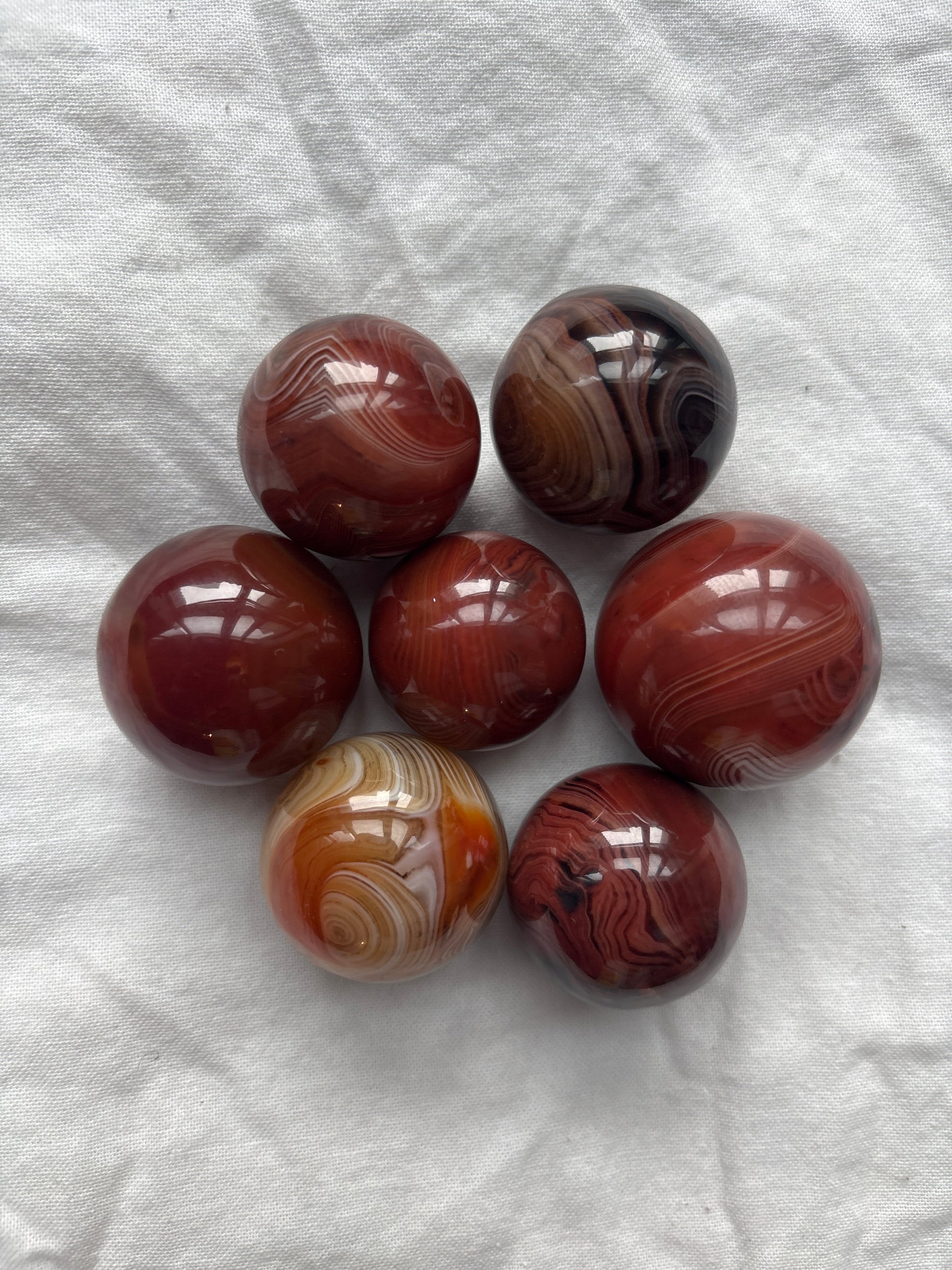 Sardonyx sphere crystal for strength, protection, and unshakeable confidence